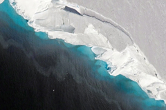 The Thwaites glacier, above, helps to keep the much larger West Antarctic Ice Shelf stable.Credit...NASA/OIB/Jeremy Harbeck