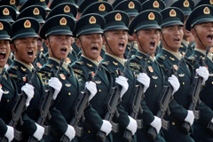 Soldiers march in formation past Tiananmen Square on Oct. 1 during the military parade marking the 70th anniversary of the founding of the People's Republic of China. (Jason Lee/Reuters)