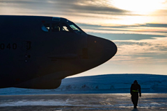 Senior Airman Josh Serafin, a B-52 Stratofortress crew chief with the 5th Aircraft Maintenance Unit, walks around the aircraft he maintains prior to crew startup at Minot Air Force Base, N.D. on January 26, 2017. It is not uncommon for temperatures in Minot to dip below minus 20, making maintenance efforts extremely difficult. (U.S. Air Force photo by Tech. Sgt. Brandon Shapiro)