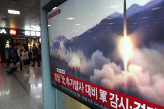 Footage of a North Korean missile launch shows on a TV screen Saturday at the Seoul Railway Station. (Ahn Young-Joon/AP)