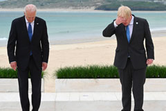 US President Joe Biden standing next to British Prime Minister Boris Johnson