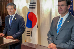 U.S. Defense Secretary Mark Esper and his South Korean counterpart, Jeong Kyeong-doo, give a news conference in Bangkok on Sunday. | AP