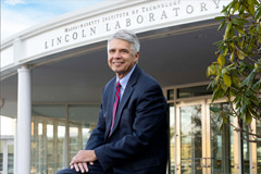 Eric Evans seated in front of the lincoln labaratory